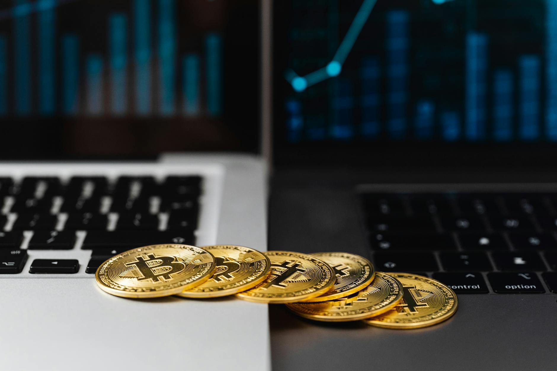 Bitcoin and laptop used for crypto tax record review